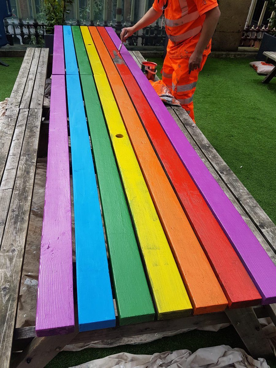 Manchester Picnicadilly benches getting a good coat of pride colours ready for this weekend! #ManchesterPride