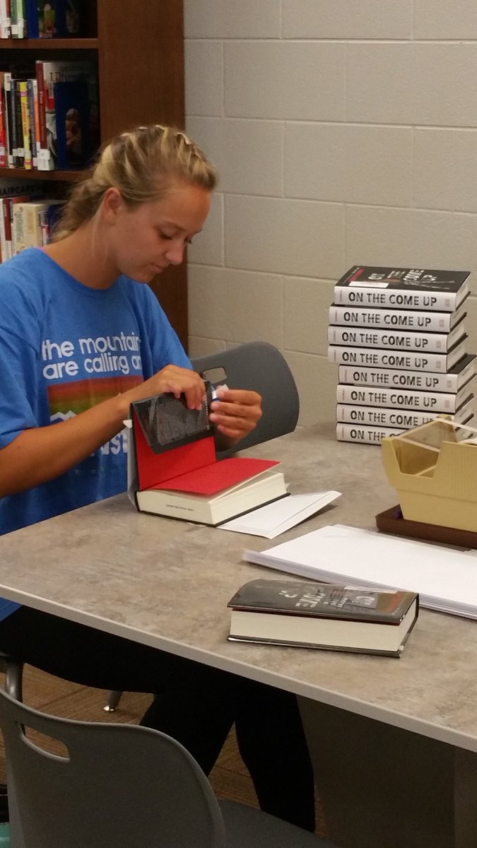 LionLibrary_CHS's tweet photo. @grettasynclair working hard to get our NEW Angie Thomas (The Hate U Give) - On The Come Up - books ready to check out!  .@CHSLionNation https://t.co/eNvKqMPnOX