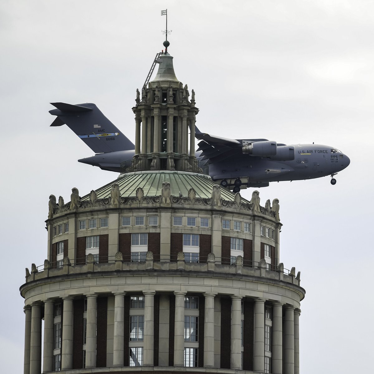 USAF C-17 Globemaster flies past Rush Rhees Library.