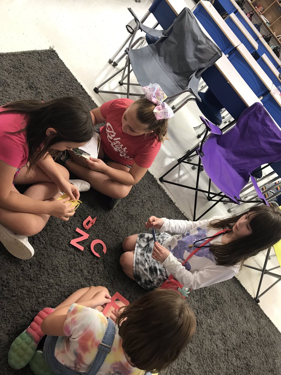 Finding lines of symmetry! #lifeisbetteratthelakes #mathrocks
