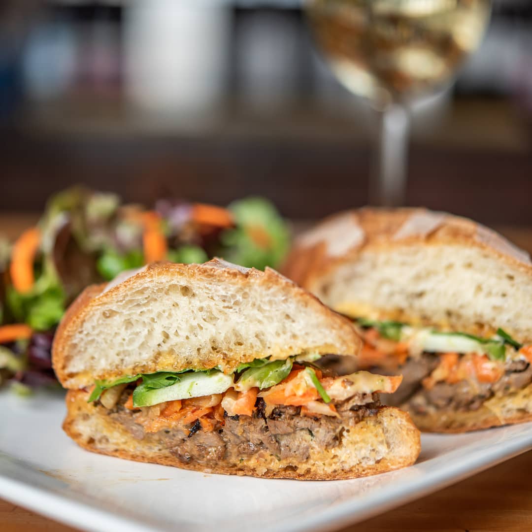 TaborTavernPDX's tweet photo. On the Sandwiches &amp; Burgers menu now! Don Mi with lemongrass beef, pickled carrot and daikon, jalapeno, cilantro, and sweet chili aioli on a hoagie roll. #pdxeats #eaterpdx Photo | @AubrieLeGault https://t.co/DS3bEKD4La