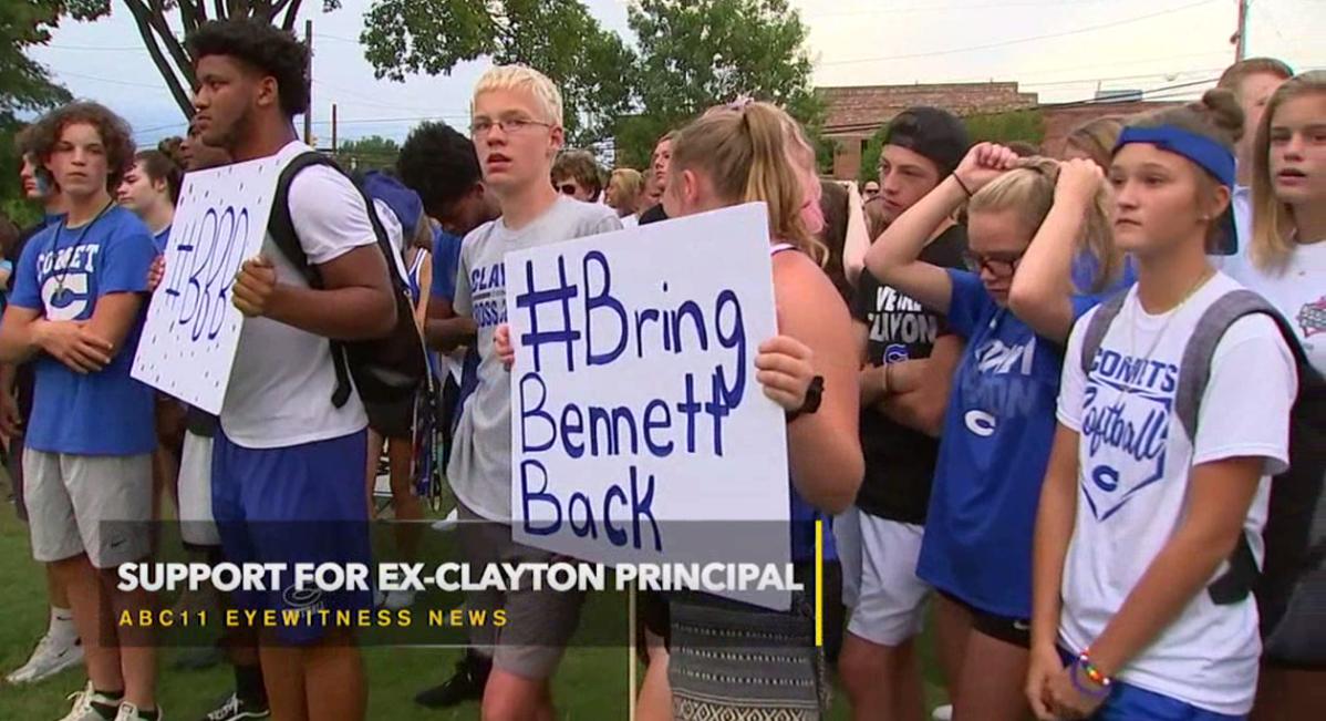 DanielsABC11's tweet photo. “He’s been treated unfairly and the community needs to know that.”
Clayton High School students hold #BringBennettBack rally for former principal Bennett Jones. 
@JoelBrownABC11 reports from Clayton town square - live at 11. https://t.co/I45sMLUGPV