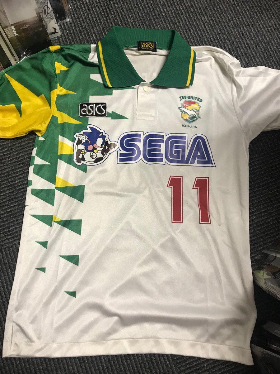 (SOLD) A beauty of a 1993 (see link below for the history of JEF shirts) JEF UNITED shirt. The SEGA sponsor, the raised printing on the back. Absolutely perfect condition. LOVE IT! WAIT - stop press - offered to a buyer and it's gone as I list! SOLD SOLD! http://www.jsoccer.com/new/j2-league/jef-united/183-jef-mascots