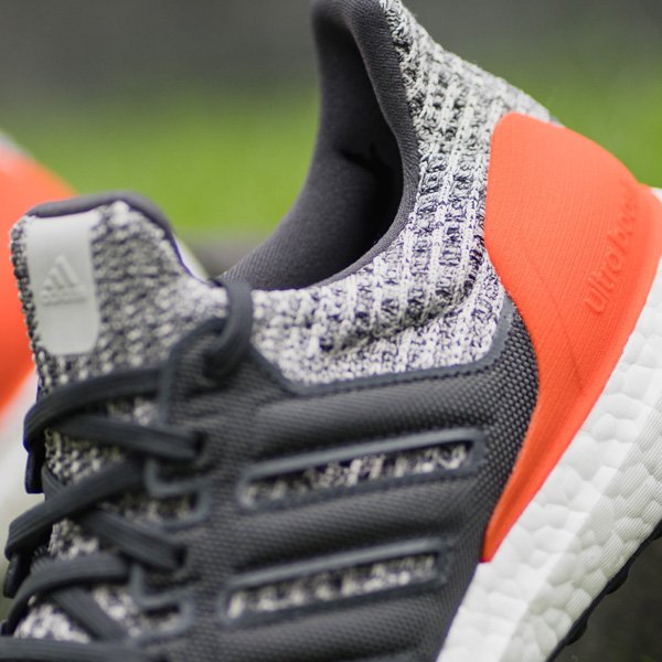 ultra boost raw white active orange