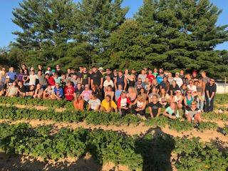 HPSEagles's tweet photo. On Thursday, the high school marching band took time out from their practices to help Kid's Food Basket pick fresh vegetables from their garden.  The harvest promotes food equity and break down barriers of poverty and hunger.  #FireUpGoEagles  #KidsFoodBasket https://t.co/o5MuJYRQhS