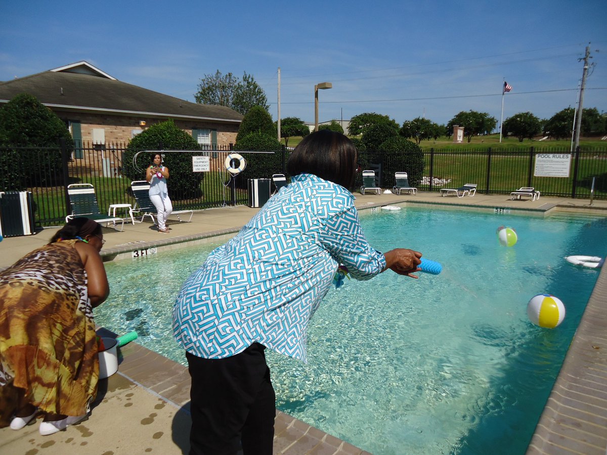 AmblingCompany's tweet photo. Heritage Park Apartments held a Luau for their residents earlier this week.  There were games by the pool, a tropical photo booth, snacks and Hawaiian music to fill the air. 

Wonderful sense of community at Heritage Park! https://t.co/nmWvd1a7MQ