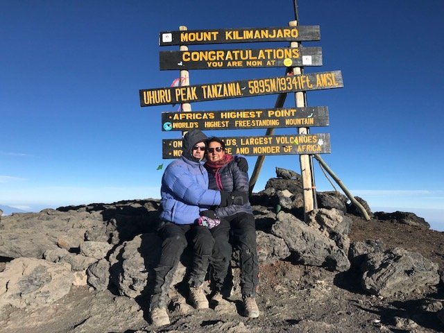 FairVoyage's tweet photo. Yay, we received a summit photo with happy climbers on it! Our clients Roopa Orora and Gareth climbed Kilimanjaro via the Northern Circuit route with our local partner @Pristinetrails. Roopa and Gareth told us it was an amazing experience! #sustainabletourism #climbKilimanjaro https://t.co/kgNGNNBjei
