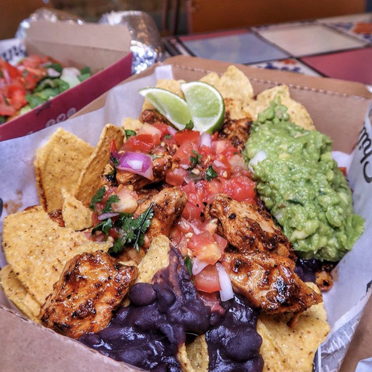 Na-cho average lunch choice... Treat yourself to a plate of bangin' THIS™ Isn't Chicken vegan nachos. Because it's Friday, and you damn well deserve it.