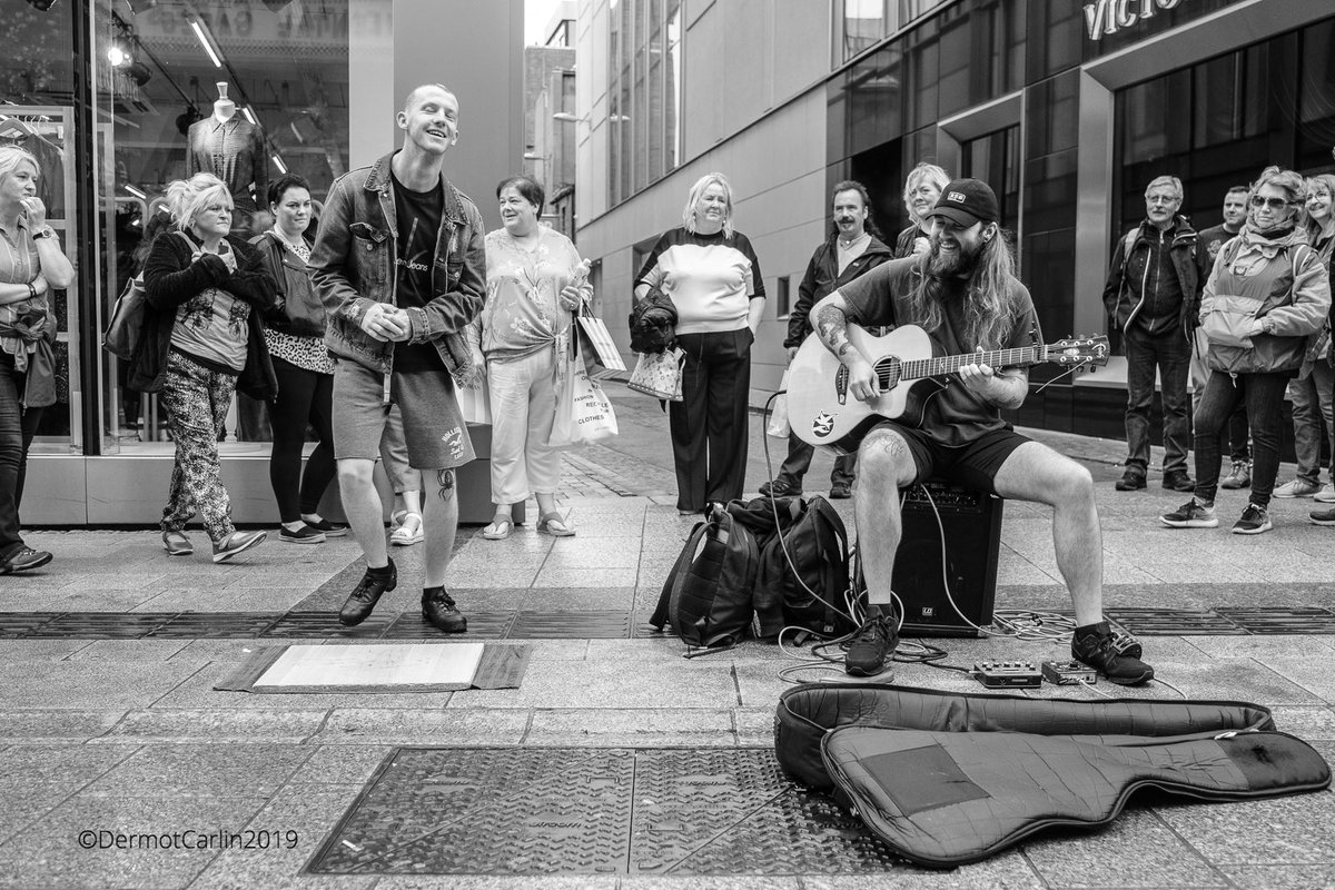 DermotCarlin's tweet photo. The joy of dance, Buskers in Grafton St Dublin @FujifilmX_UK @StreetPhotoInt #streetphotography #blackandwhitefriday #Monochrome #Travel https://t.co/C7JUWVyiSf