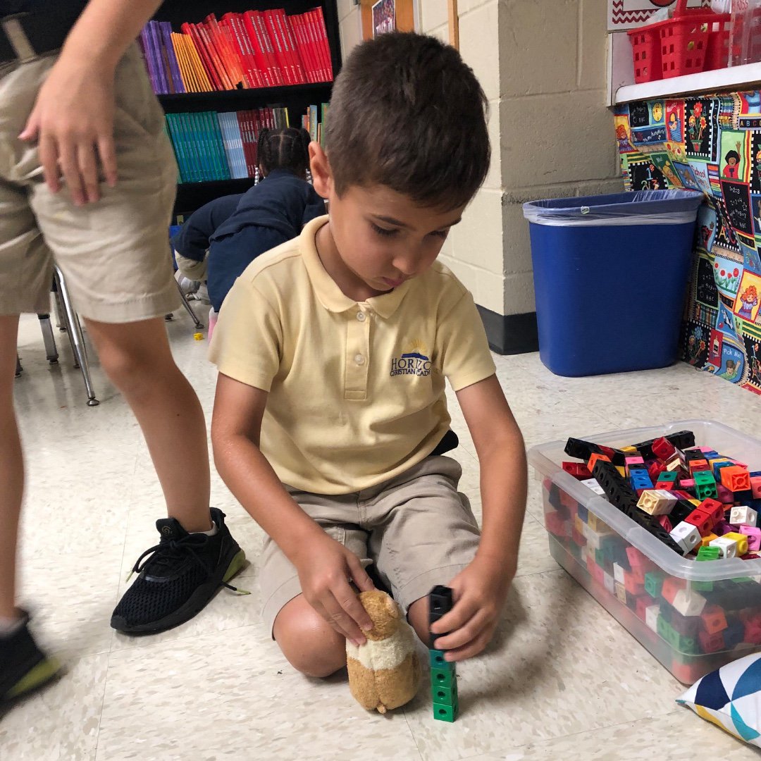 hcagawarriors's tweet photo. Our first graders show another way that HCA takes a "hands on" approach to learning! Using nonstandard units of measure (counting cubes, markers, eraser caps, etc) develop critical thinking skills as well as fine motor skills. π #WarriorWisdom #HCALife https://t.co/AXgNPtLXOj