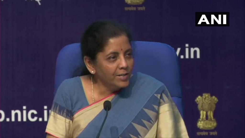 ANI's tweet photo. Union Minister for Finance and Corporate Affairs Nirmala Sitharaman during a press conference in Delhi: Just to give you briefly a picture of what is happening globally. The current projected global GDP growth is of about 3.2 % and probably is going to be even revised downwards. https://t.co/yG9Wi0ePII