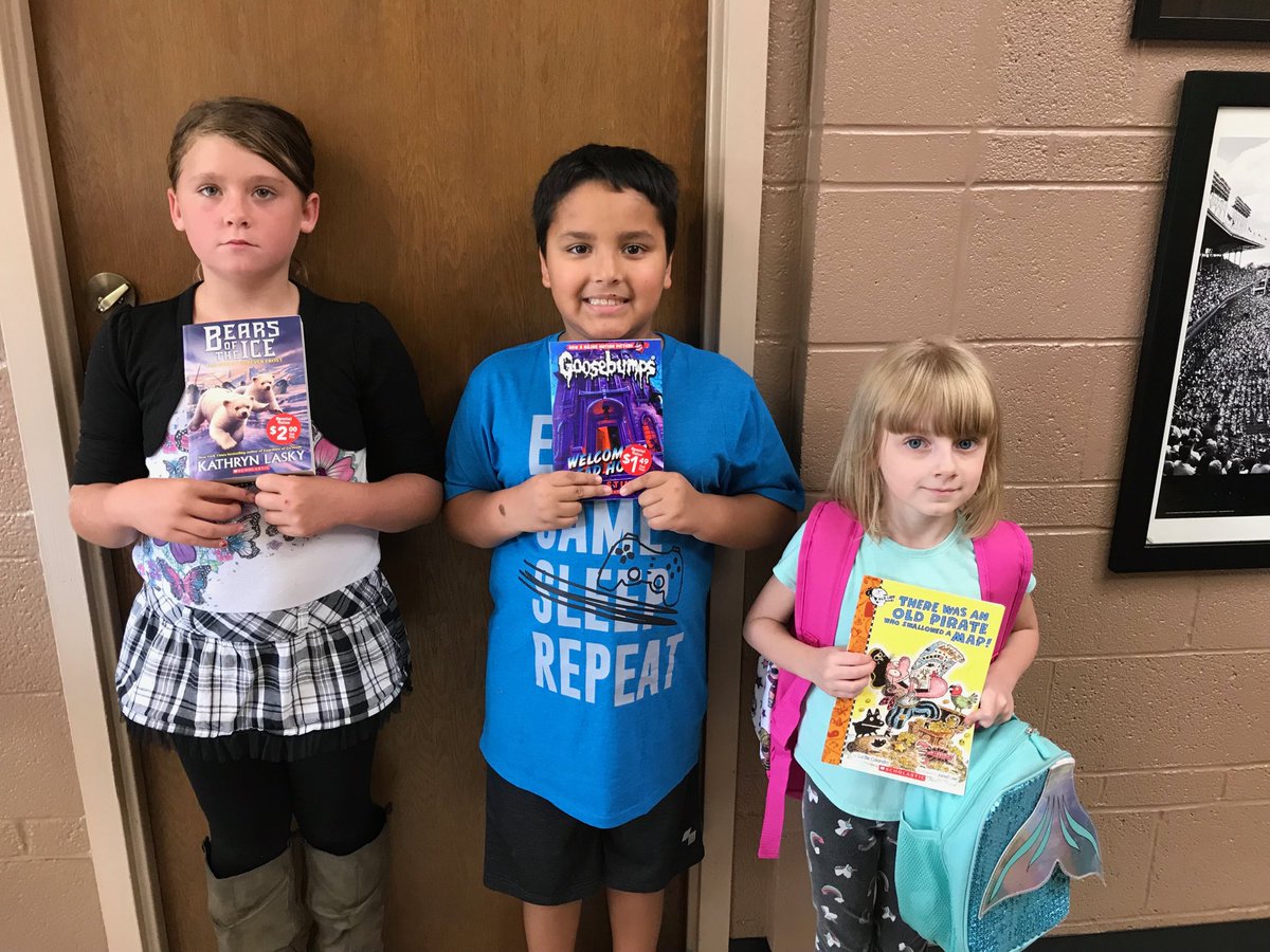 Look at these birthday kids with their new books.  Keep reading!