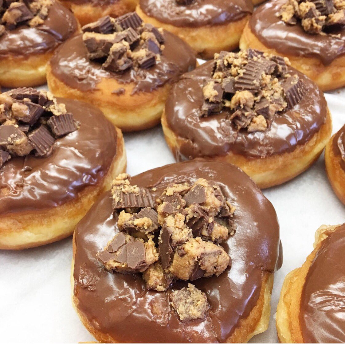 Happy Friday friends!!! There’s no better way to end the week than with a couple of Reese’s donuts! Peanut butter filled, chopped Reese’s PB cups on top!