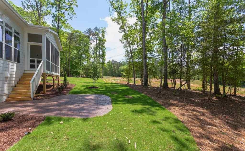 JordanBuiltNC's tweet photo. This stunning luxury home in features a 3-car garage, gourmet kitchen and a family room with 10' ceilings and a brick-surround fireplace with custom mantle and built-ins. The gorgeous rear screen porch has tile floor and a fireplace! Learn more here: https://t.co/oUzzkQVytz https://t.co/b9FJ6MiXlk