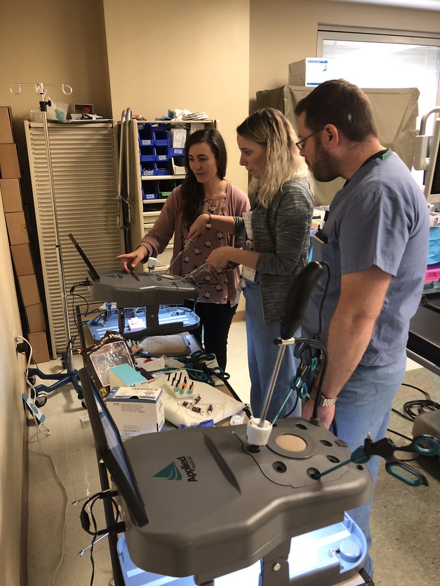 SimCity007's tweet photo. So great to have one of our past OB/Gyn Simulation Chiefs back in the lab today. Laparoscopic Suturing lecture by Dr. Cesta with Applied Medical tissue extraction, and FLS skill enhancement. @AppliedMed_GYN @Em0219 https://t.co/nqJtru4AiK
