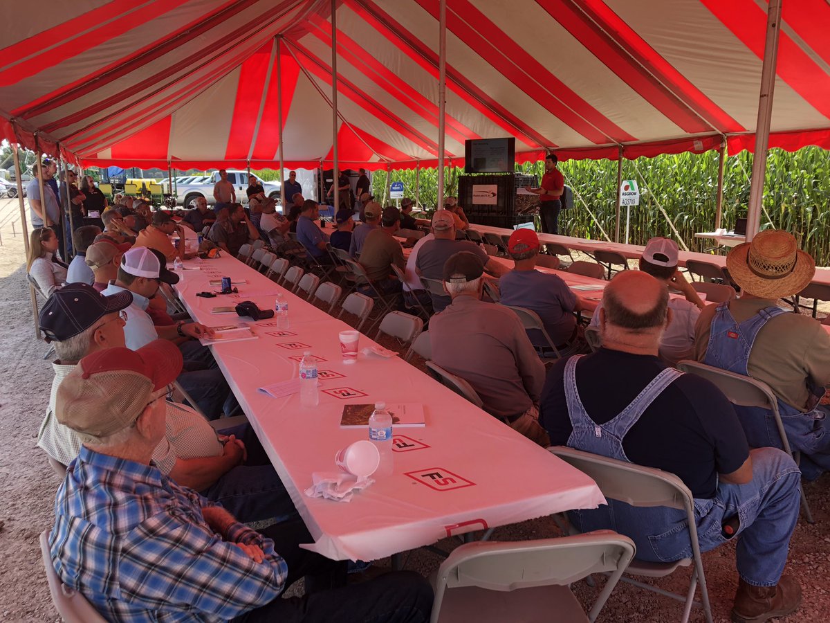 Nathan Parker <a href="/PrairielandFS/">Prairieland FS, Inc.</a> discuss Precision Fertility tools with a good crowd of customers at the Kinderhook Field Insight Day.