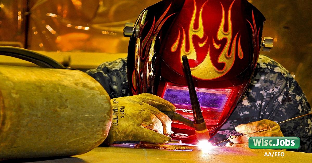 Image: welder in a helmet