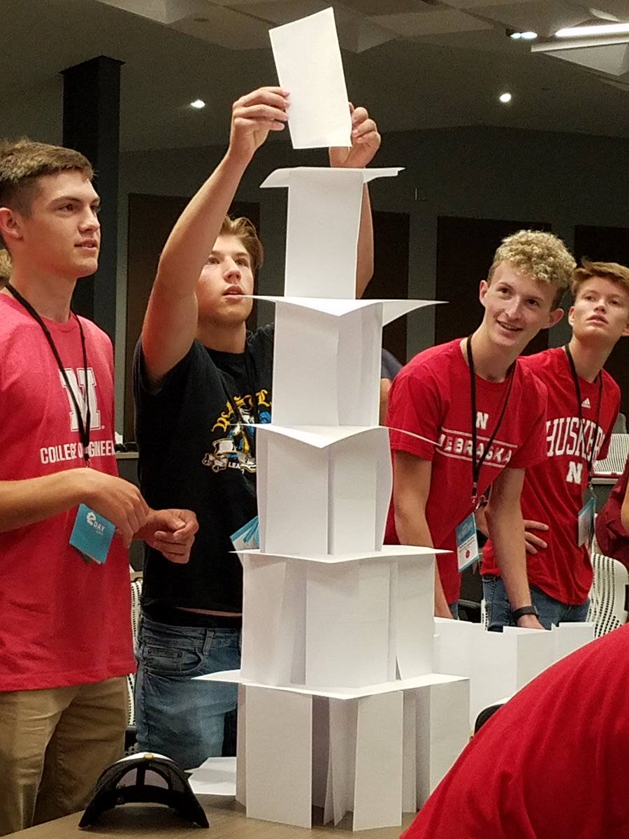 NebEngineering's tweet photo. A group of first-year #NebEngineering students participate in a building exercise during the E-Day tour of @kiewit. #NUBE2019 #DoBigThings #WeDontCoast #WeEngineer @OmahaChamber https://t.co/SeZmQa3ntP