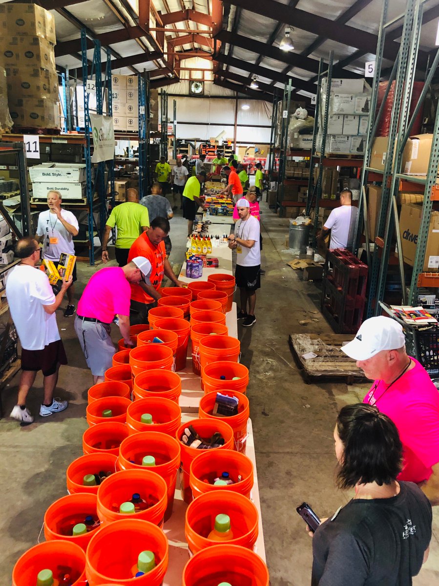 AmericasCarMart's tweet photo. Buckets full of kindness. Car-Mart was honored to recently partner with #churchworldservice at #ferncliffcamp in Little Rock, Ark. to fill 500 emergency clean-up buckets with necessities for displaced families. It’s always a great time #helpingourneighbors. https://t.co/Xd0Afw9xv3