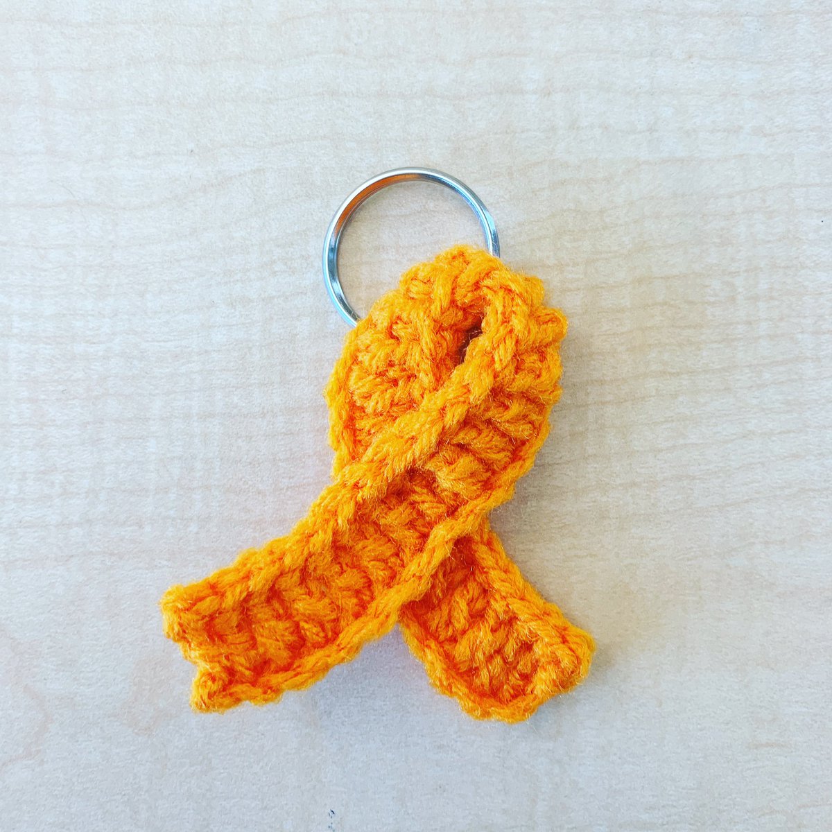 MrsHolsapple's tweet photo. Feeling so blessed today. My mom was diagnosed with Leukemia in July. This team has been incredibly supportive, all wearing orange today to show love! Even the 5th graders wore orange and a parent made keychains for my class! #cancersucks https://t.co/qlh2XrxH18