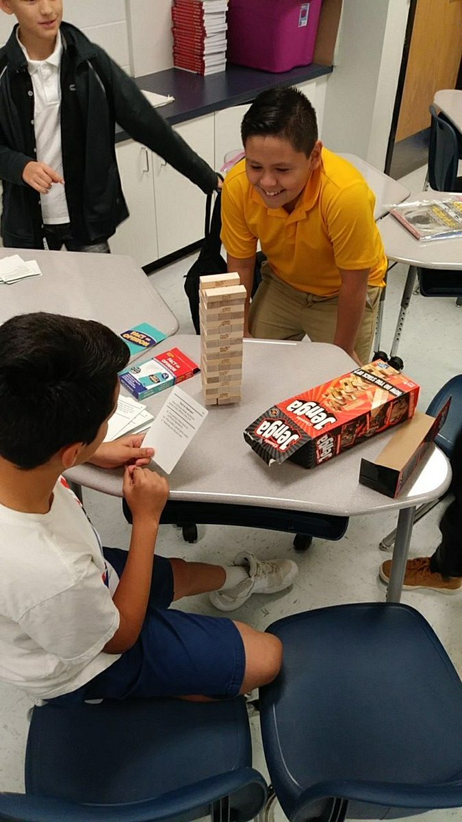 MrsRamirez_HAMS's tweet photo. ELAR Intervention class reviewing context clues, main idea, and fact v opinion. If they chose the correct answer they then took a turn removing a jenga piece. #TeamSISD @HAntwine_MS  😀👥🐾 https://t.co/pV4dQZE0Gh