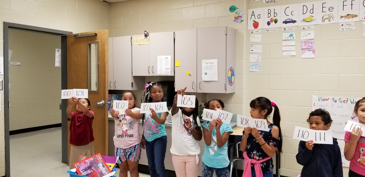 StaceyDiane67's tweet photo. We are busy ordering numbers from 100 to 120! We had a number parade in the room while we counted! #letstaskaboutit @Math_w_McKnight https://t.co/raFjGqeuze