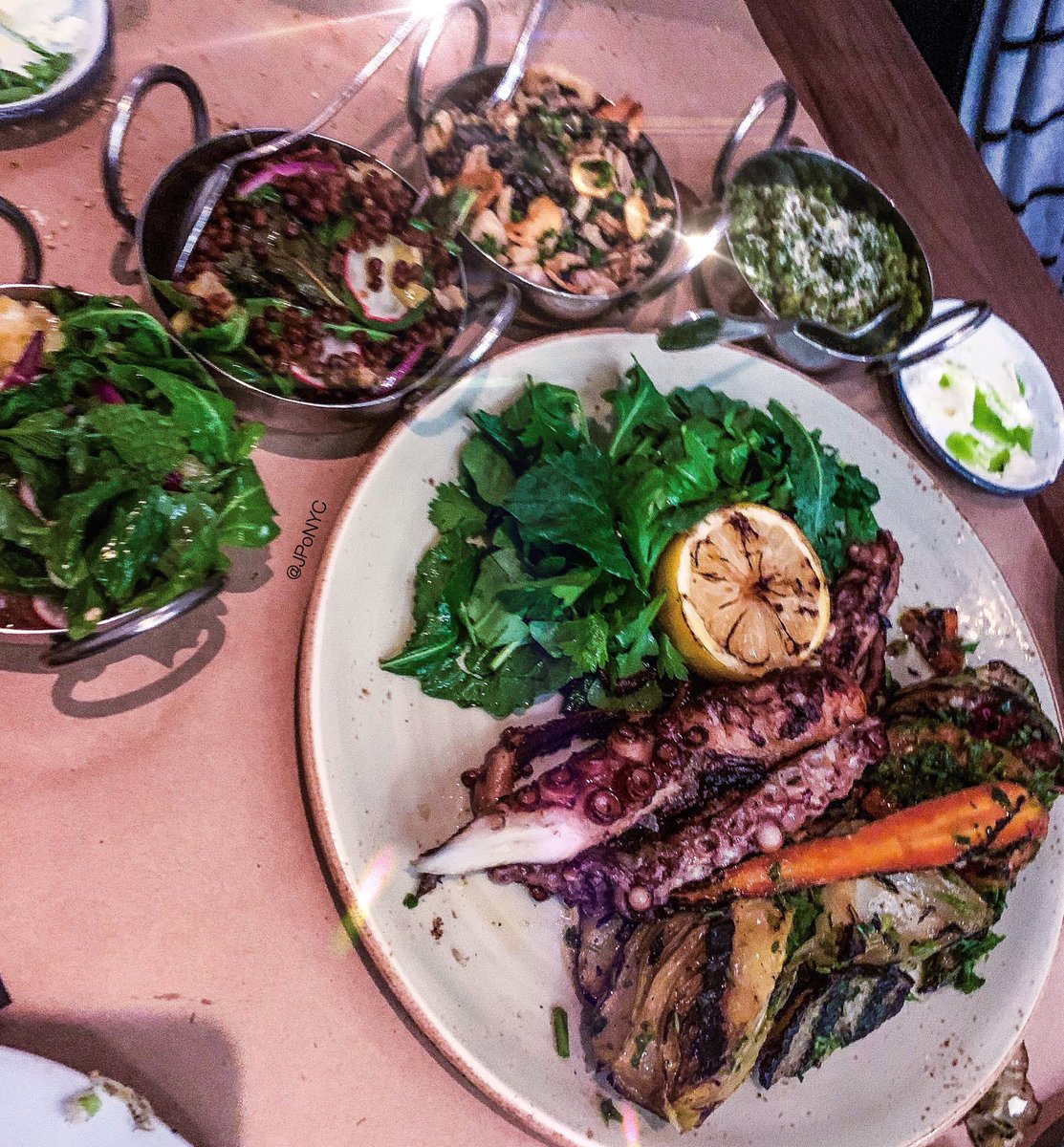 JPoNYC's tweet photo. Outstanding #octopus over @lamalonyc!
The daily spread included 16 different types of delicious mezze &amp; the slow roasted short ribs were also amazing as with their only dessert. 😋 @arlohotels #NYC #nomad #ful #mejadara #freekah #bakbook #israelicouscous #lamalonyc  #bossladies https://t.co/RO6BuxfgbO