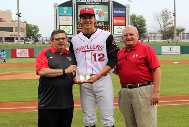 TexasLeagueMiLB's tweet photo. .@logangilbert22 of the @ARTravs receives his @TexasLeagueMiLB Pitcher of the Week award from league president @TGP717 and Travelers president Russ Meeks. From Aug. 12-18, Gilbert was 2-0 with a 0.00 ERA and 16 strikeouts in 11 shutout innings, while allowing just 6 hits. https://t.co/0nJFi5Cu3B