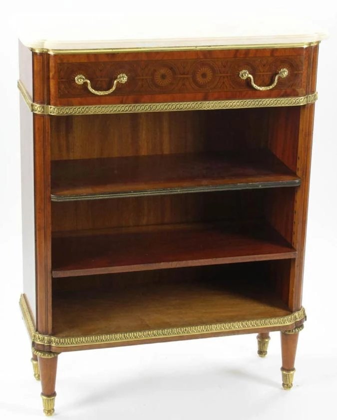 Find gorgeous 19th century open side cabinet with white marble top over a gilt-metal bound edge and on tapering feet with decorative sabots. 
#cabinet
Buy now - tinyurl.com/yyaw8npe