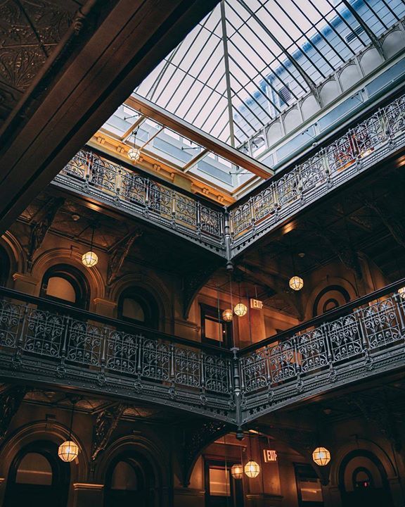 The atrium of The Beekman, A Thompson Hotel, which is located in what was originally known as the Temple Court Building, an 1890 Queen Anne, neo-Grec, and Renaissance Revival–style office building that was landmarked in 1998. 📷: <a href="/sparkshotz/">TheKar</a> via Instagram