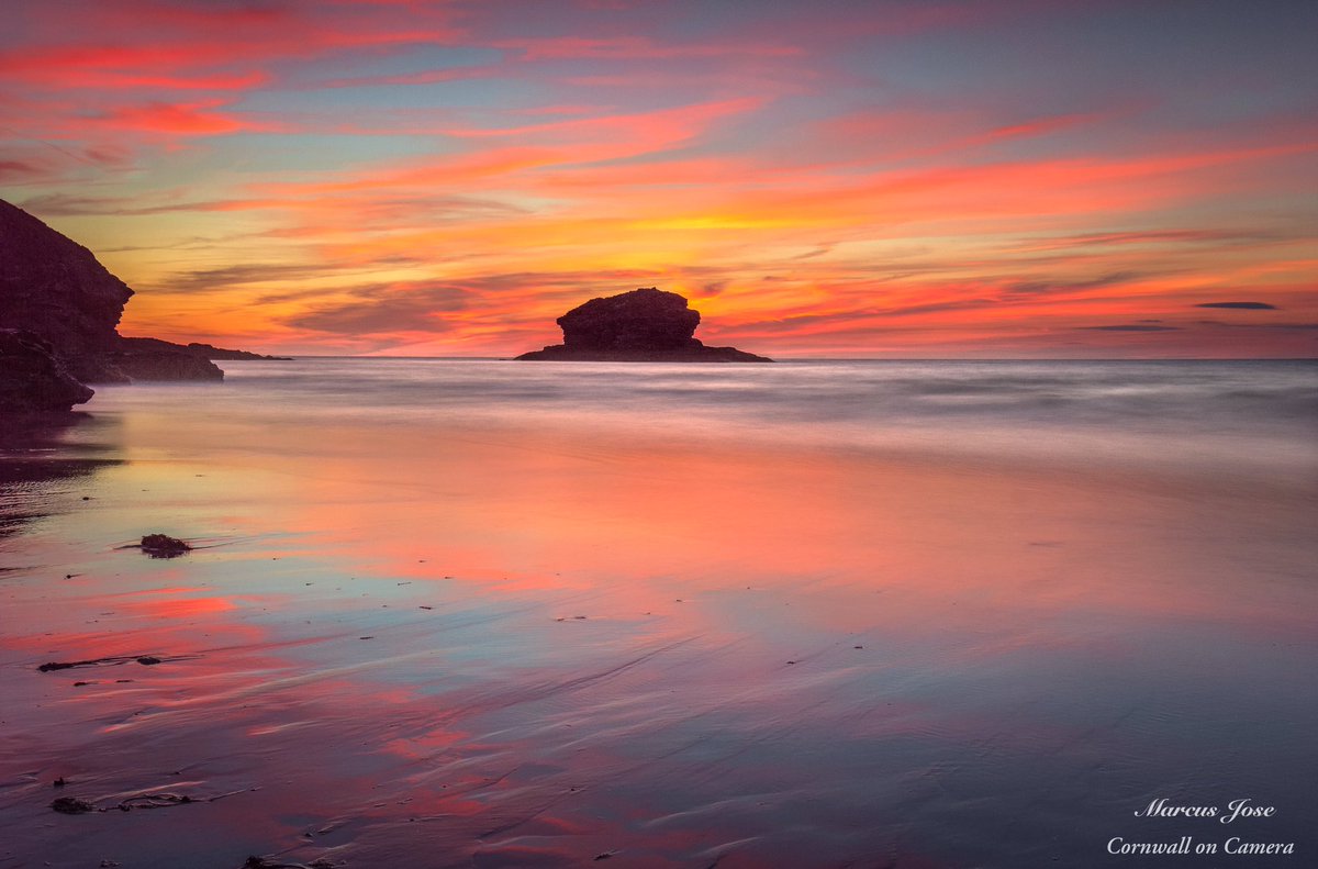 A very colourful and vibrant sunset over Gull Rock at Portreath, I just love the reflection of that sky on the wet sand. 
#kernow #cornwall #portreath #beach #colour #reflection #sunset #sky #clouds #seastack #art #sand #photography #landscape #seascape #Nikon #nisifilters