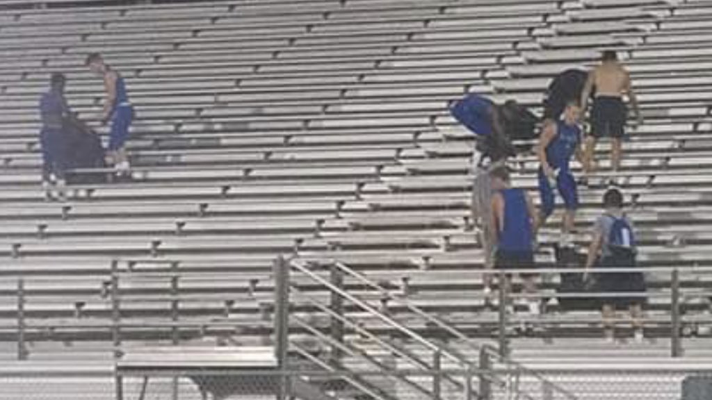 SchoolPrc's tweet photo. Living out the Blue Devil Code: PRC football players help clean Hancock’s stadium after a tough loss...You guys make us all #PRCProud!
#BestYearYet #BlueDevilCode #Respect https://t.co/WfiFAzwRw8