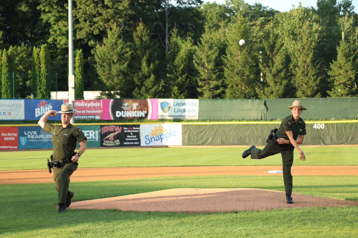 NYSDEC's tweet image. To celebrate #smokey bear’s 75th birthday, DEC Forest Rangers threw out the 1st pitch at the TriCity Valley Cats game. Local scouts cheered on. #smokeybear75