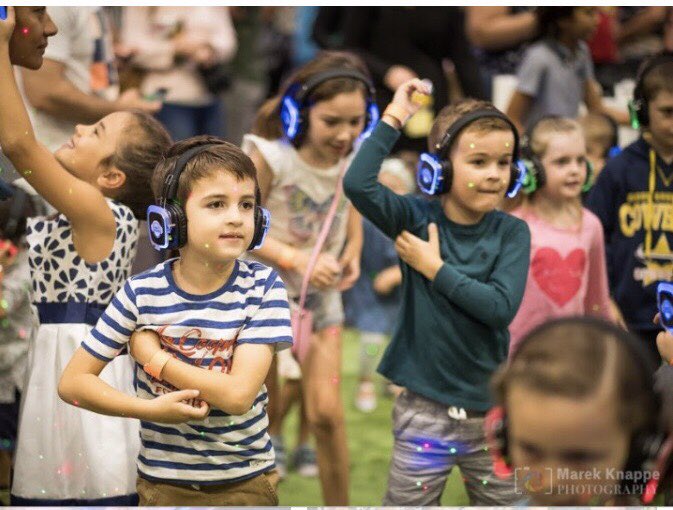 MillRoadSummer's tweet photo. Children’s silent disco happening now outside Tesco! Come and join in, everyone welcome. #grandefinale  #millroadsummer #millroadcambridge #streetparty #whatsonincambridge #enjoymillroad https://t.co/k3JcHfS4Cp