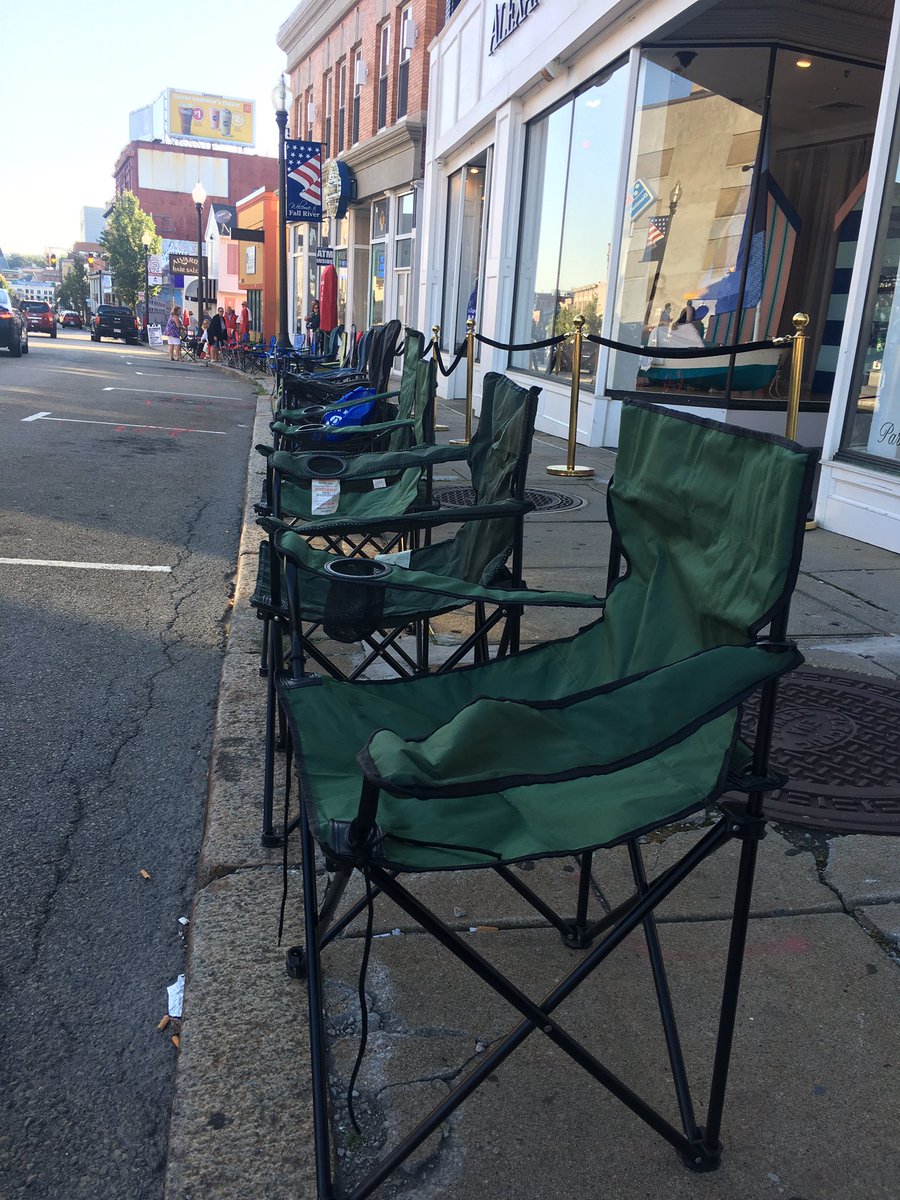 ThePortChannel's tweet image. People lined up their chairs on Columbia &amp;amp; S Main Street here in Fall River for the Grandes Festas do Divino Espírito Santo da Nova Inglaterra Bodo de Leite ! Are you here ?! Tweet a photo at us! We’ll include it in our televised program! #grandesfestas #fallriver #bododeleite