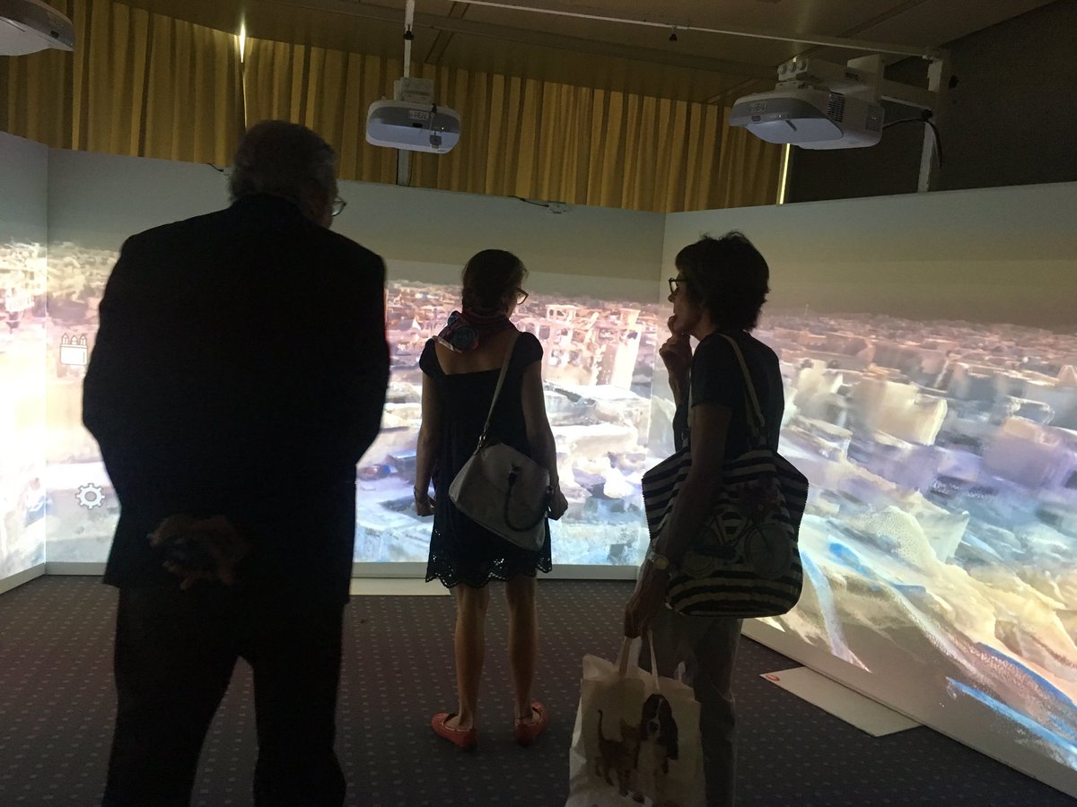 elounasso's tweet photo. I visited the exhibition “Broken Cities at the #MEMSummerSummit Forum featuring 4 cities affected by the conflicts: #Damascus, #Aleppo, #Palmyra and #Mosul with images donated by #UNESCO and #ICONEM #ReviveTheSpiritOfMosul @USI_MEM https://t.co/8SQ5wQ7Vhz