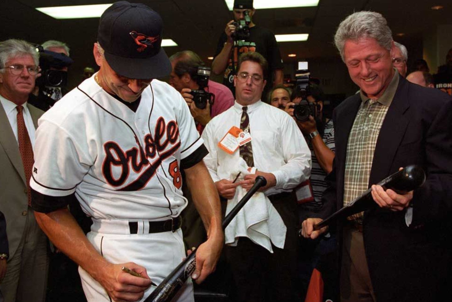 Happy birthday today to some guy named Ripken, signing an autograph for President Bill Clinton    
