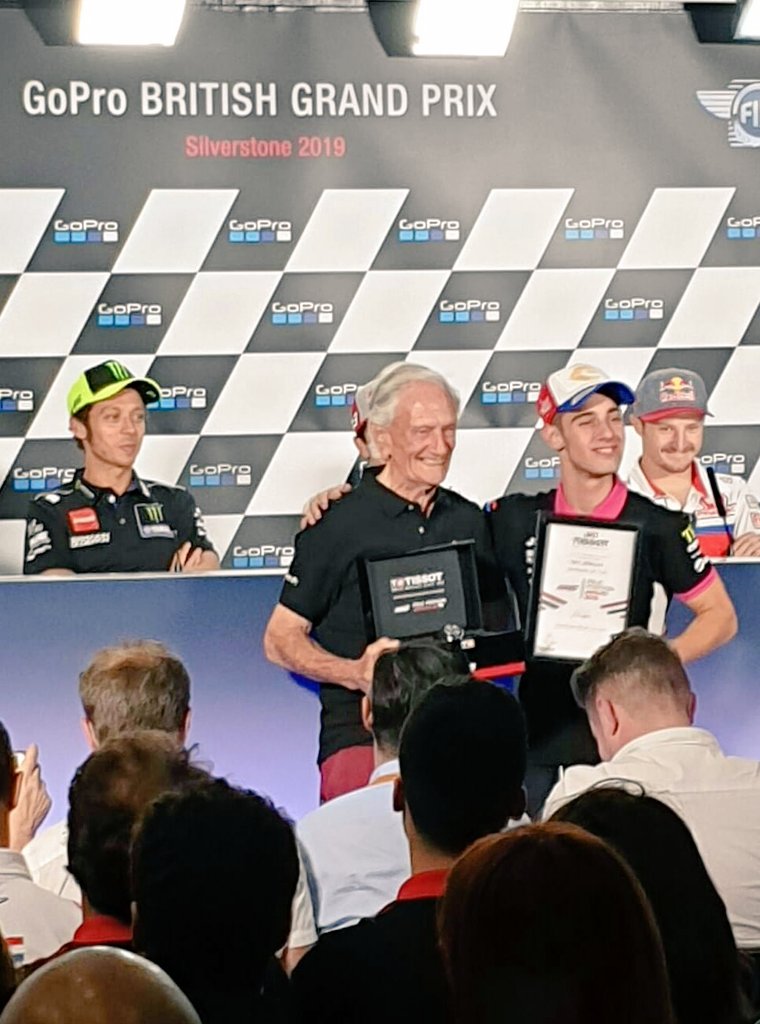 dainese's tweet photo. Here is 6-time World Champ #JimRedman congratulating #Moto3 pole-sitter @TonyArbolino at @SilverstoneUK while #MotoGP stars @ValeYellow46 and @jackmilleraus are watching... #dainesecrew #BritishGP @MotoGP https://t.co/NCIzxgVzWs