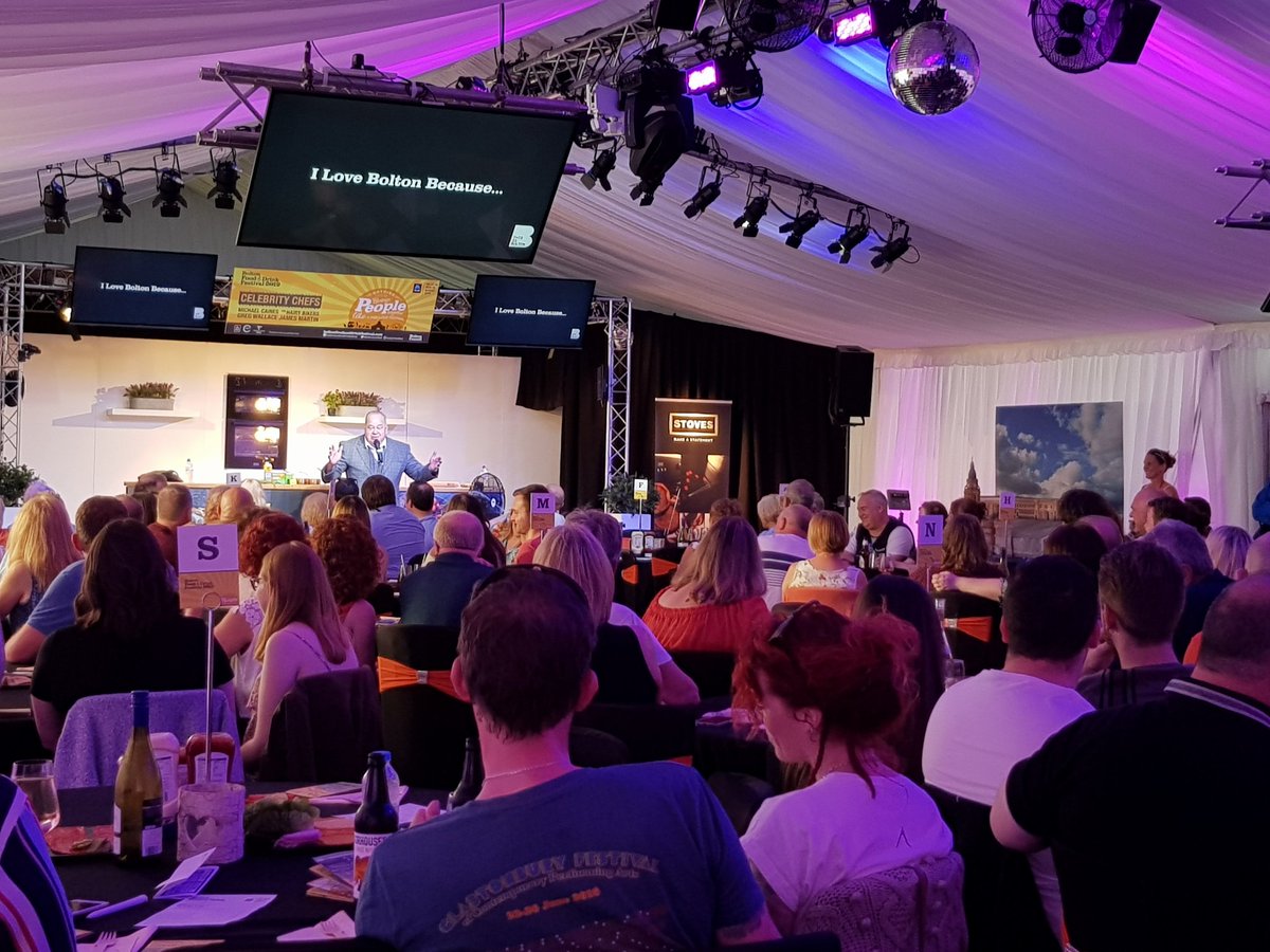 John Archer entertains the crowds in the <a href="/BoltonFoodFest/">BoltonFoodFest</a> marquee as the burger and comedy night gets under way
