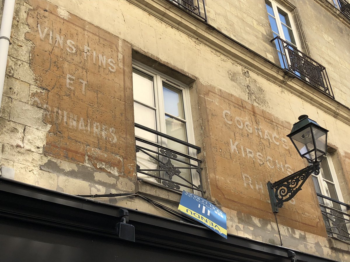 nomadexhibit's tweet image. Shops and signs @visitnantes - old and older #streetgraphics #signs #shopsign #frenchstyle
