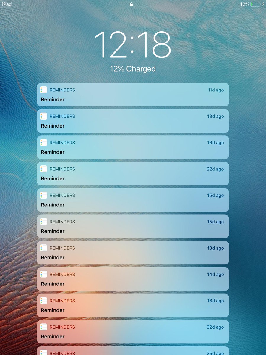 iPad lock screen with 50 reminders.
