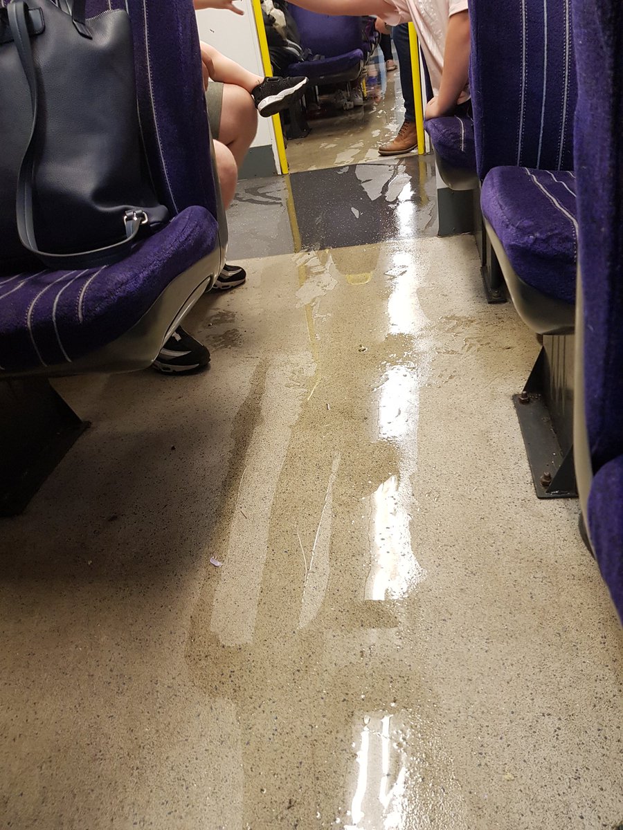 mikemooredev's tweet photo. Travelling in style with some suspicious liquid flowing from the toilet cubicle @northernassist #52205 https://t.co/wbOJQsIwF4