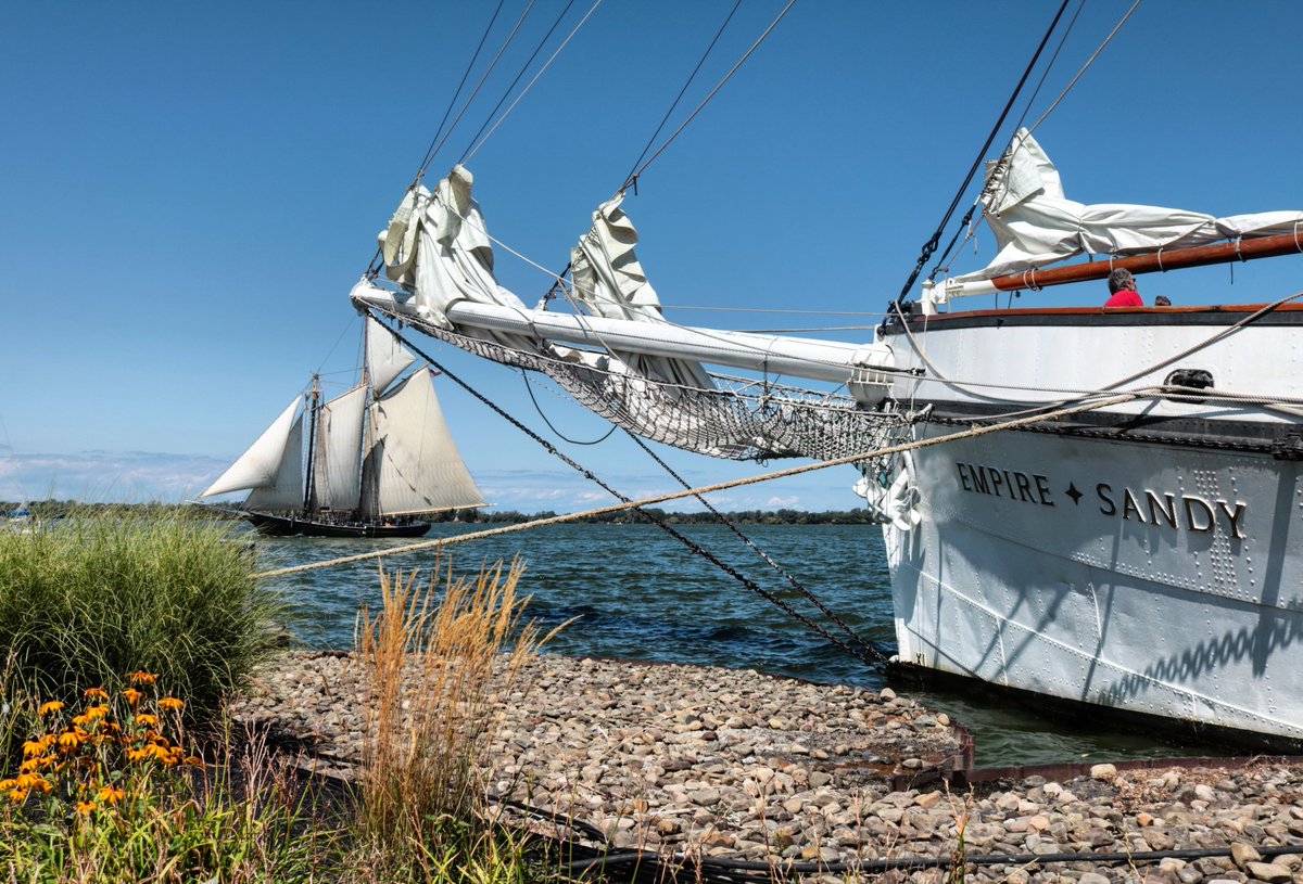 Pat_Bywater's tweet photo. As #LettieGHoward sails by, #EmpireSandy conducts deck tours at @TallShipsErie. https://t.co/ztzSSO40dg
