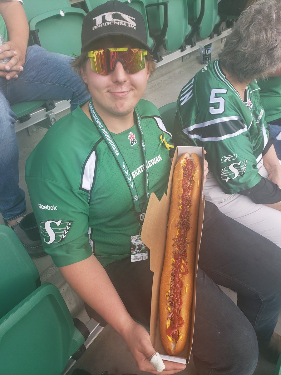 Dixie_827's tweet photo. Game day with Logan! He is brave trying out the dirty lineman!  #RidersLive https://t.co/bC8gyHNZIm