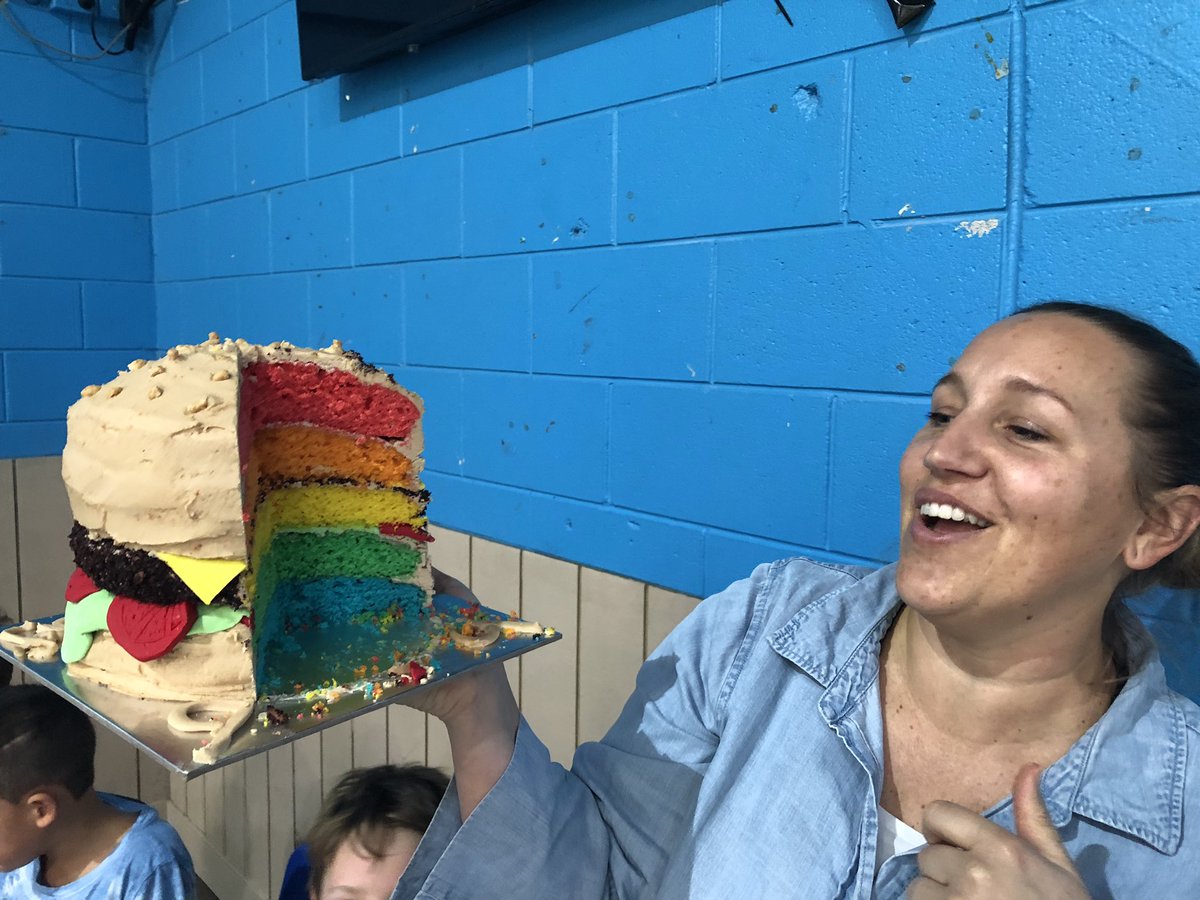 RobertGlancy's tweet photo. Burger cake update. Check out the rainbow inside. Jemma is a genius. Nailed it! https://t.co/CvpHwYeH9e