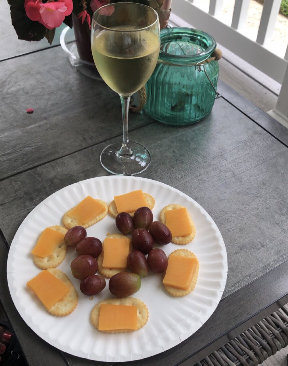 julia_mullaney's tweet image. I’m sitting on the porch reading and my dad randomly brings me a glass of wine and a cheese plate (he did his best) and this is why we can’t settle, ladies