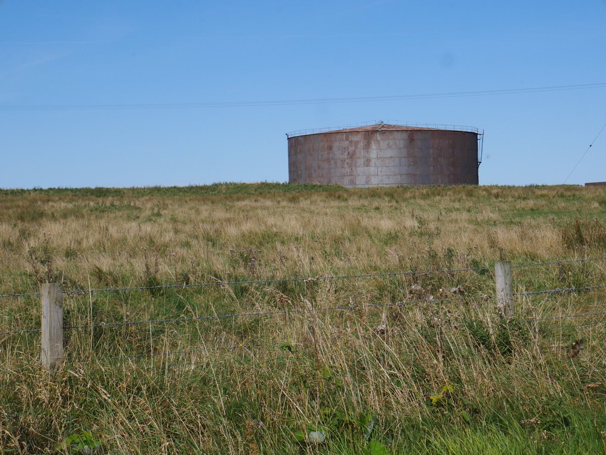 wtbattlefields's tweet photo. Major naval base at #Lyness on #Hoy. From 1916 to 1919 a bustling supply port. Many contemporary #FWW buildings survive along with the piers and one of the original oil storage tanks. https://t.co/5tU8MwuYIa