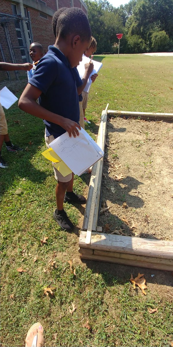 DCollier5's tweet photo. @PriceOwls Third Grade students finding the perimeter of our outdoor garden. https://t.co/JdgQKJQGX2