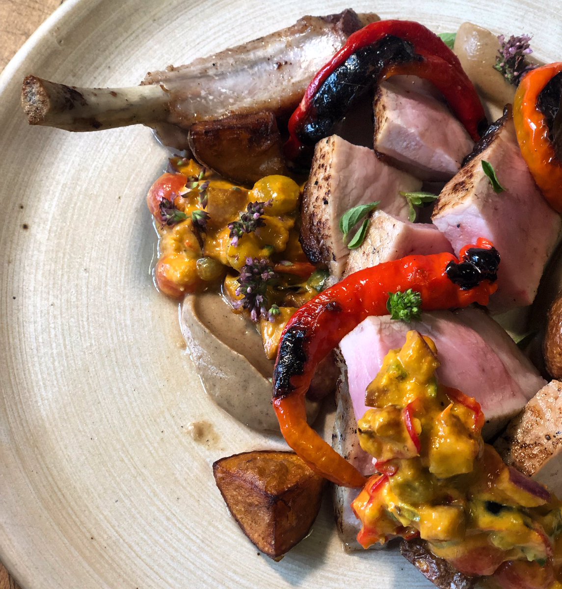 It’s Fried Chicken Friday from 5:30-9. Besides tonight’s Extra Crispy Double Breaded Whey Brined Fried Chicken with all the fixins we are also featuring this very special entree:
Double Cut Pork Chop // Smoked Eggplant Purée // Heirloom Peppers // Late Summer Caponata