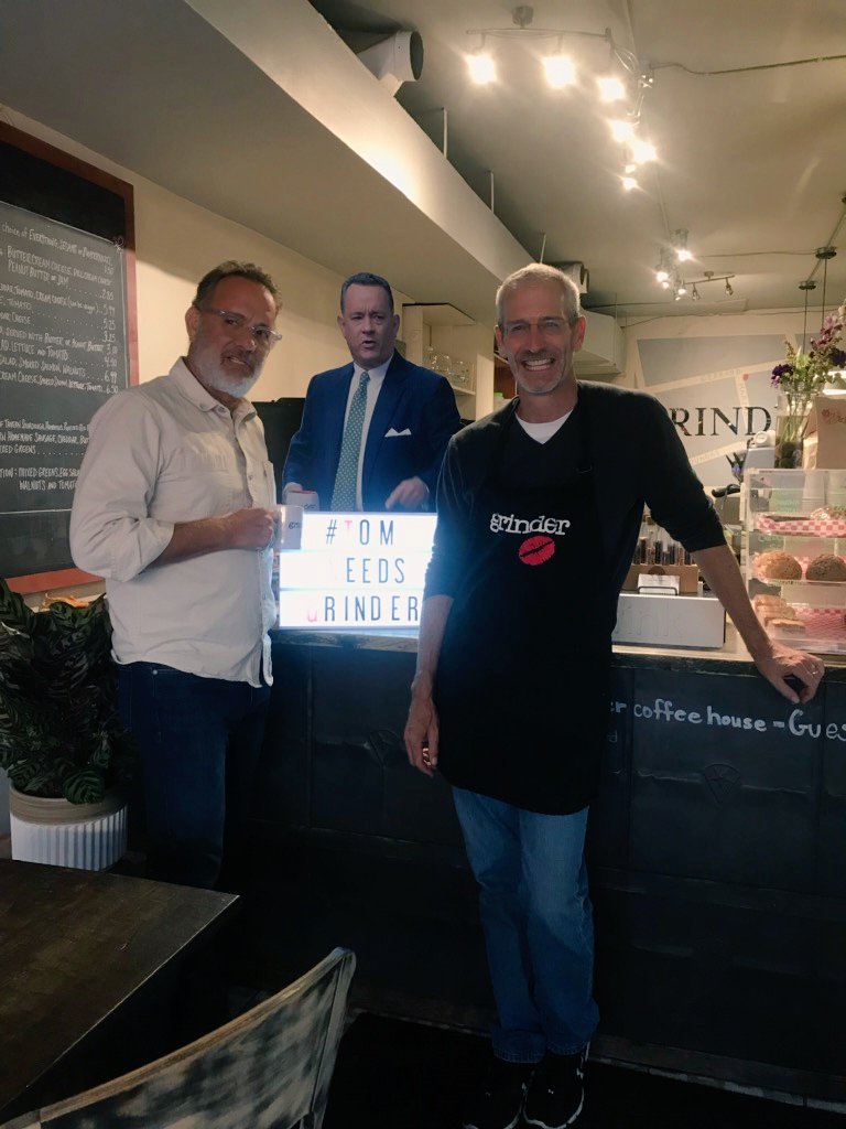 GrinderCoffeeTO's tweet photo. Day 7.5 of our #tomneedsgrinder campaign.  New#: #tomneededgrinder sorry for the bad pics he came when we were closing up.  Joelle was at home but had a lovely chat with him. Thanks @tomhanks for taking the time to come by and visit us we admire you. #TIFF19 https://t.co/iOCVo7SelP